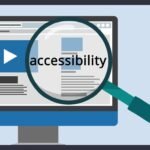 A magnifying glass held over a web page on a monitor, enlarging the word accessibility