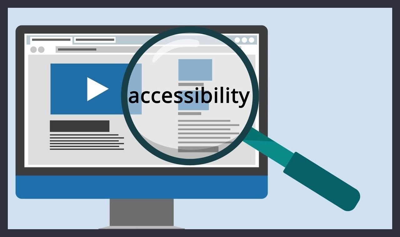 A magnifying glass held over a web page on a monitor, enlarging the word accessibility
